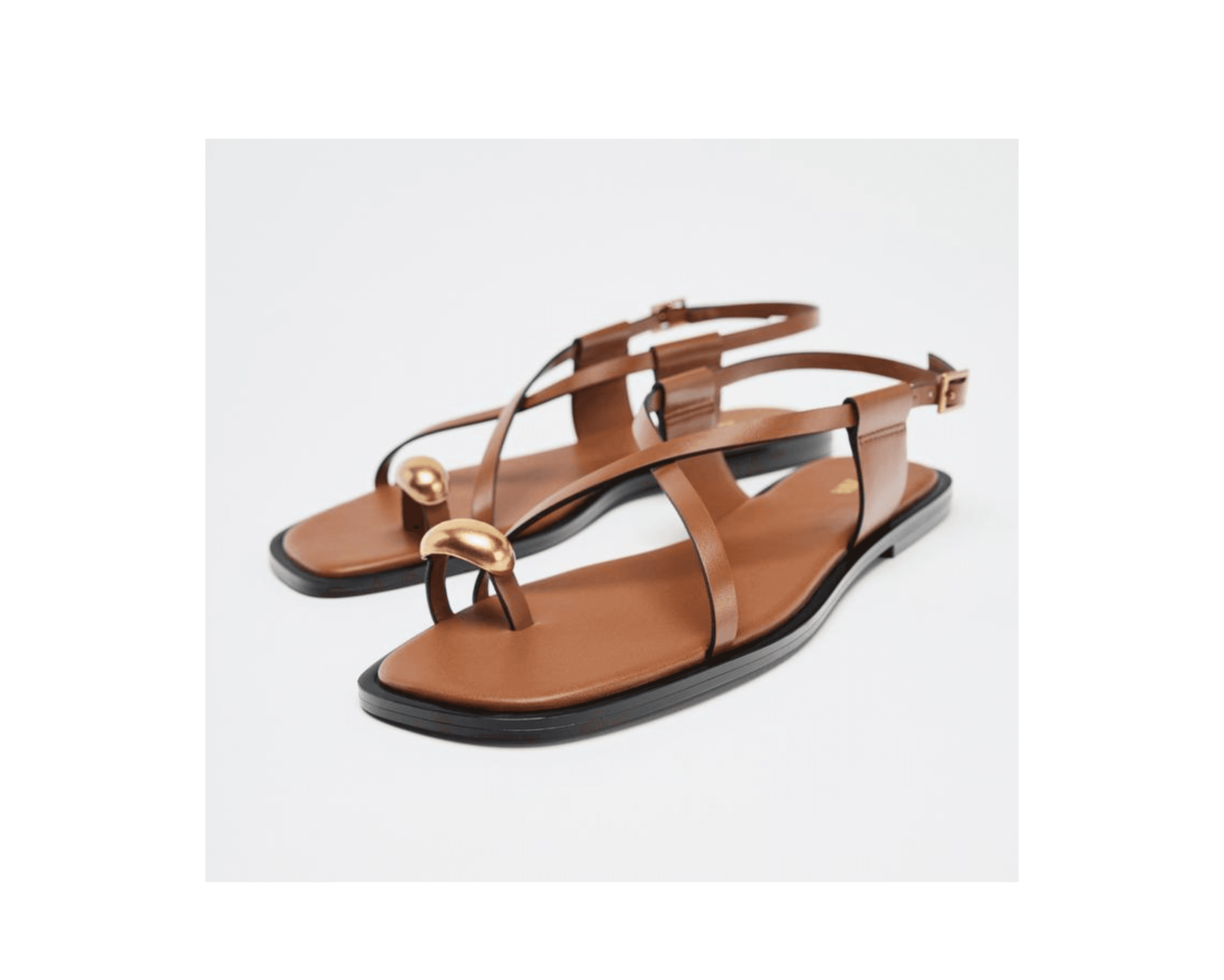 FLAT SANDALS WITH STRAPS AND METAL DETAIL